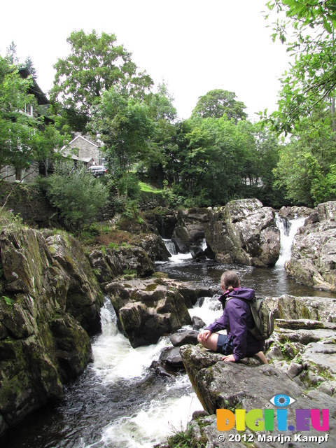 SX23134 Jenni on rocks by Afon Conwy at Betws-Y-Coed